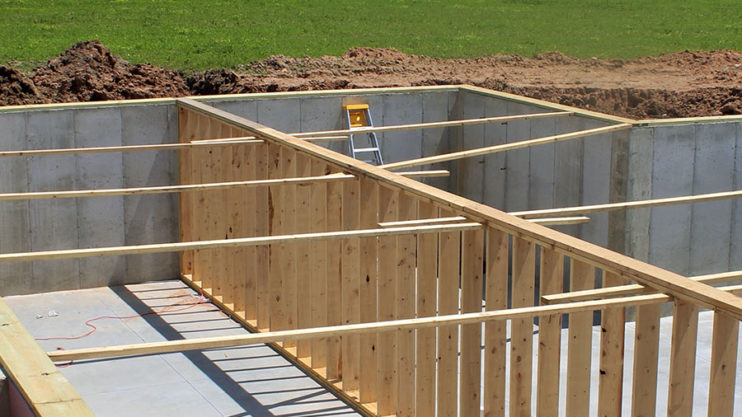 monolithic slab foundation with poured concrete walls